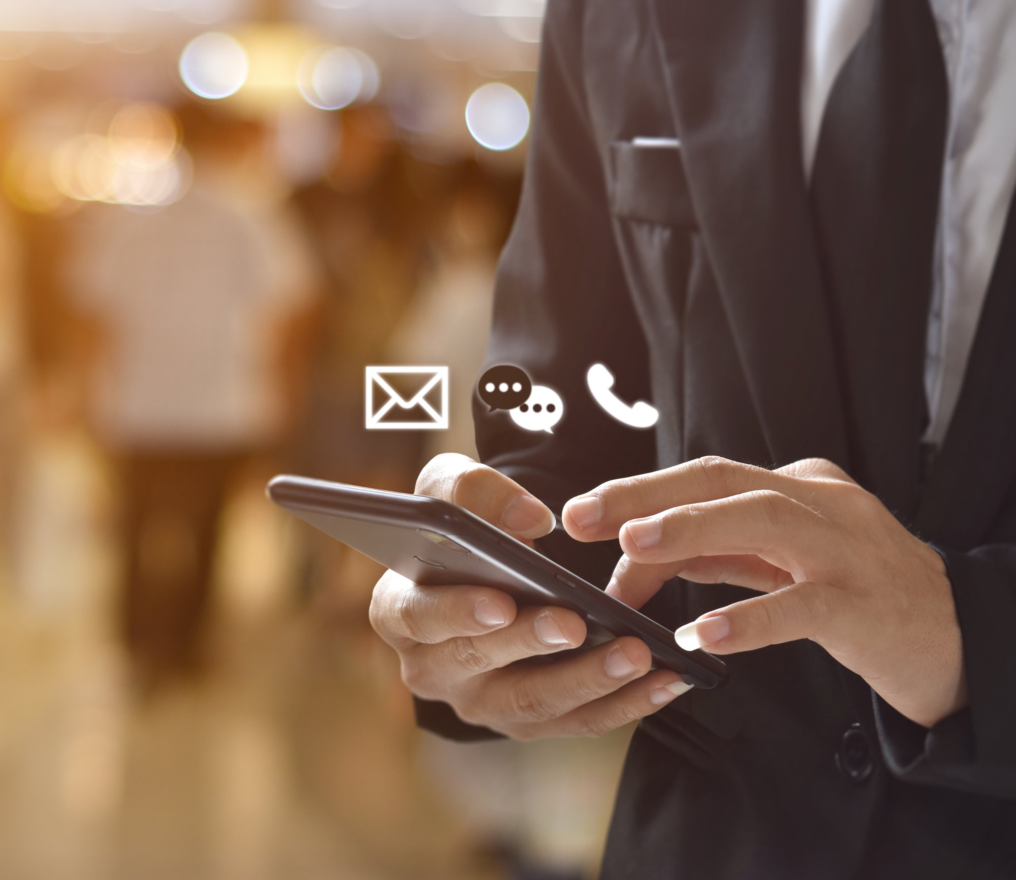 businessman-holding-smartphone-with-message-calling-email-icon-concept-contact-support-people-contacting-information-business-1